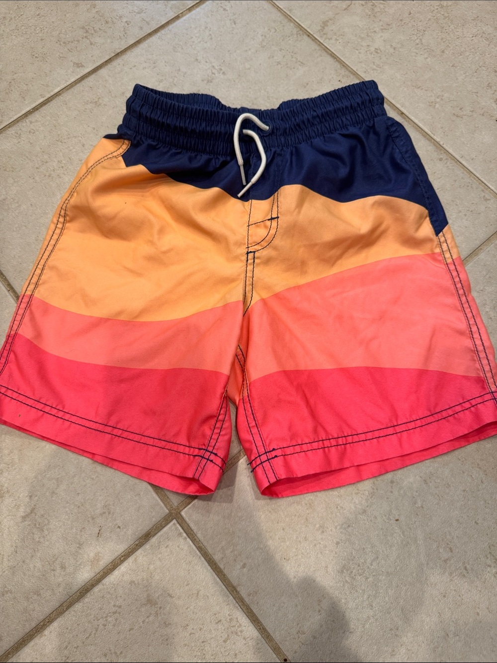 Old Navy kids Swim Shorts in Coral, Orange, and Red